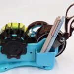 أداة لقص ولصق شرائح ورق اللصق/الشريط